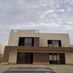 أين تقع Palm Hills Alexandria؟