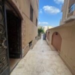 عمارة كامله للاستثمار ف الحي الخامس الجيزة بسعر محصلش 300 متر